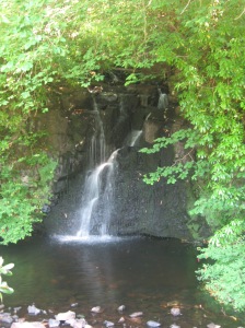 One of the many waterfalls on the grounds of Dunvegan Castle, Skye, Scotland. (Copyleft Avery Oslo, 2010)
